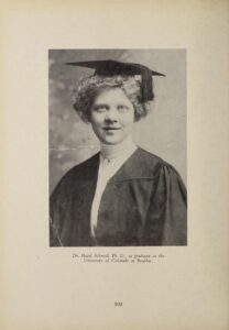 Hazel Schmoll in cap and gown after her graduation.
