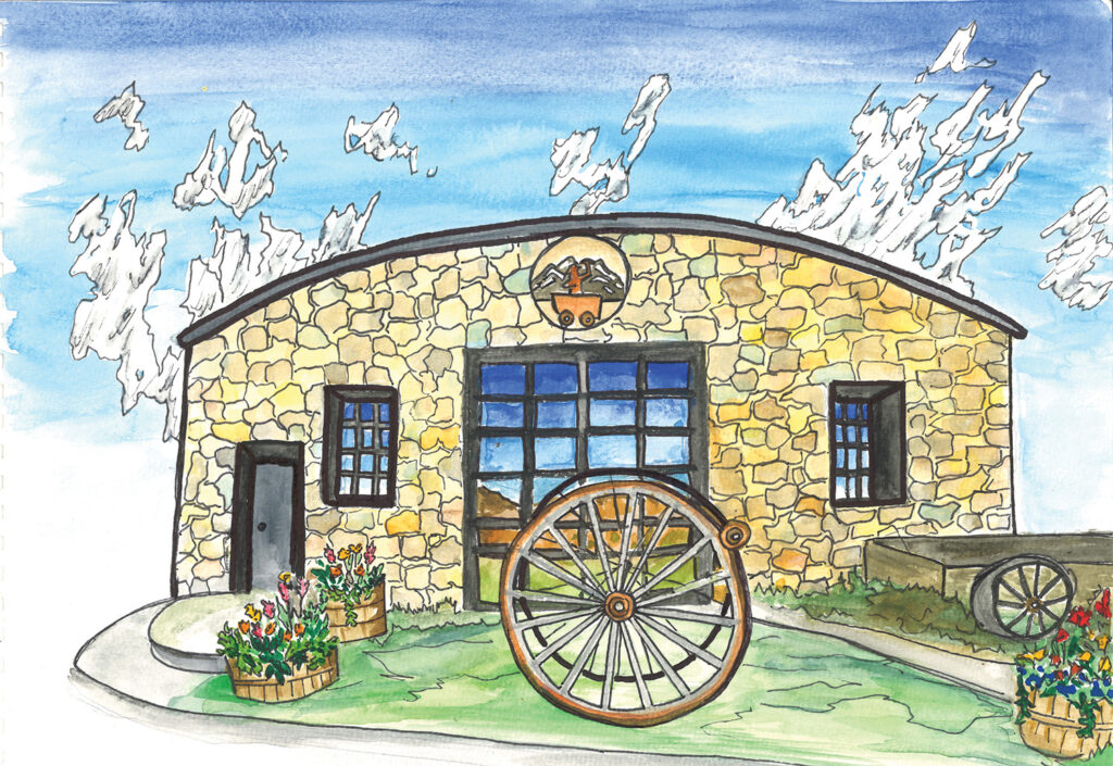 Watercolor illustration of the Nederland Mining Museum, a stone building with a large wagon wheel in front, colorful flower barrels, and mountains reflected in the windows.